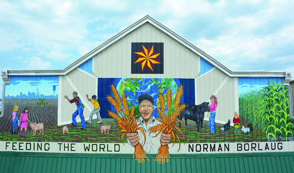 Macomber creates Cresco mural honoring Borlaug