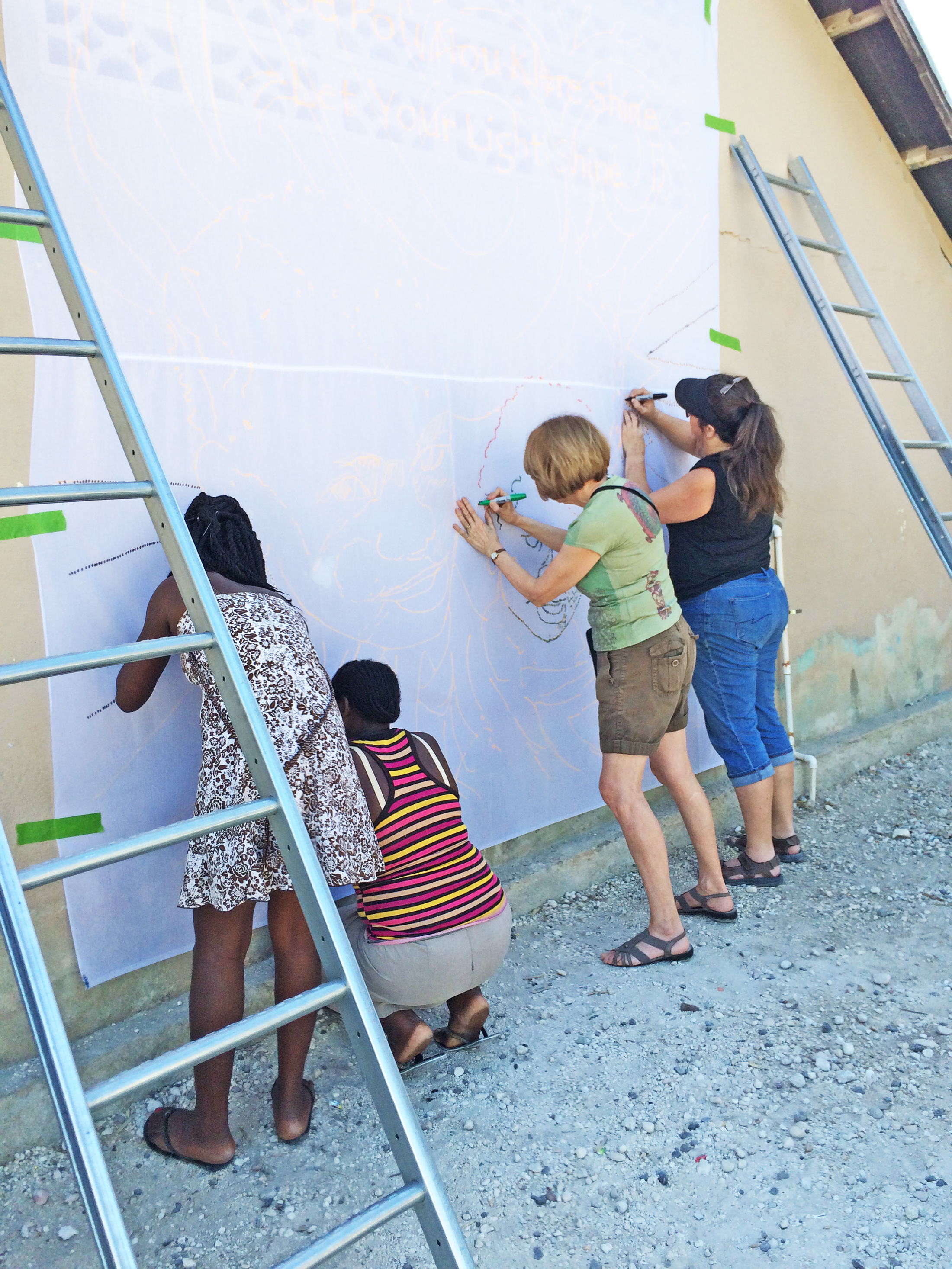 Shining light brightens Haitian walls