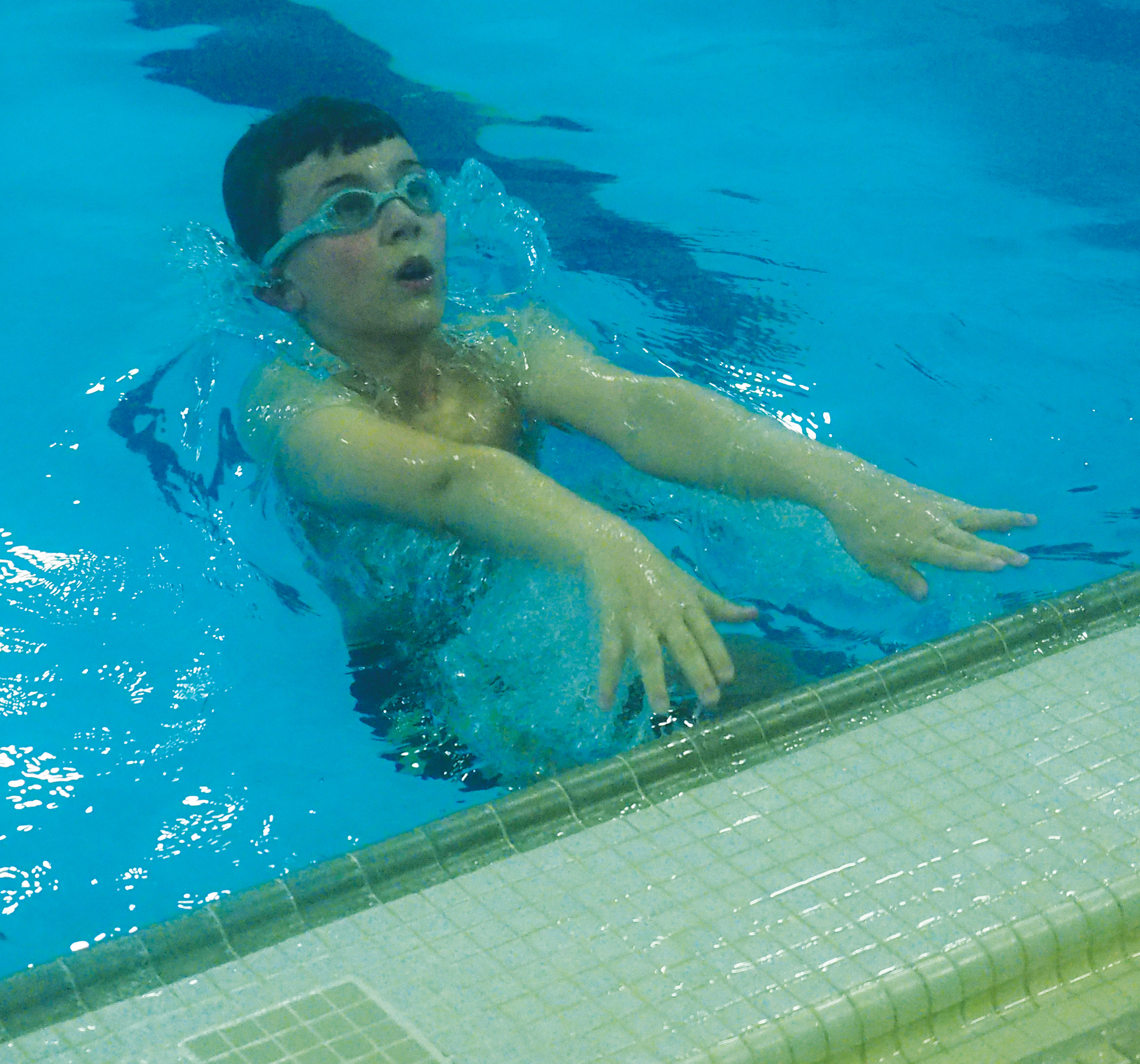 Charles City YMCA Swim Team qualifies 8 to state meet