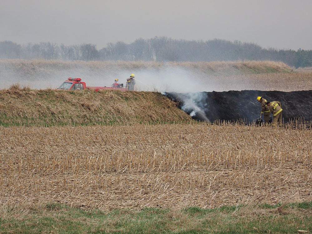 Colwell, Floyd departments douse field fire