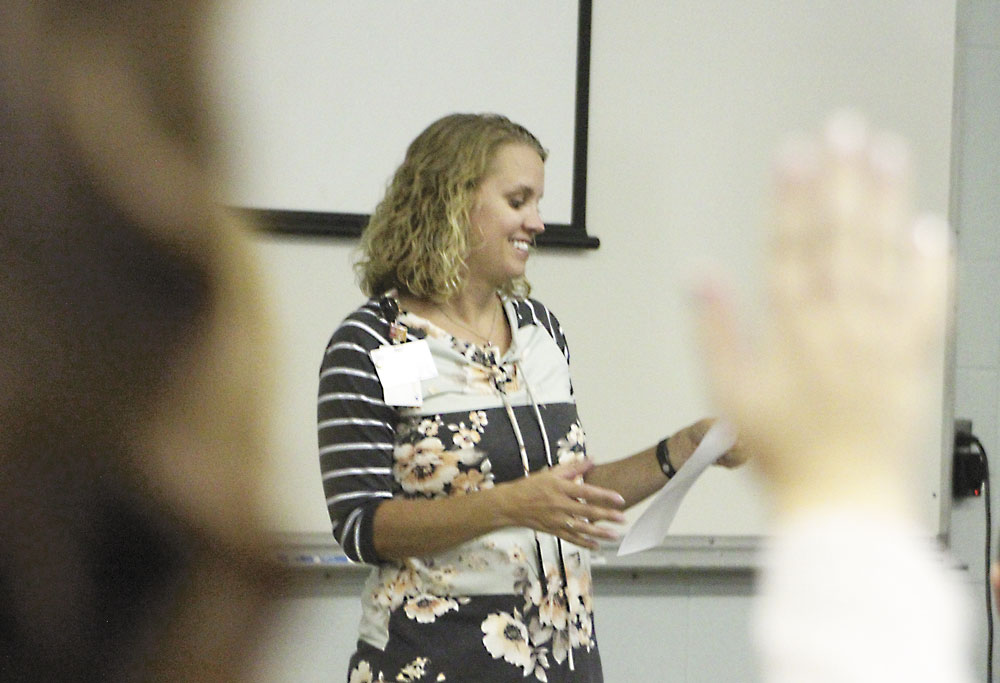 Business partners offer first pitches of the year to Iowa BIG North