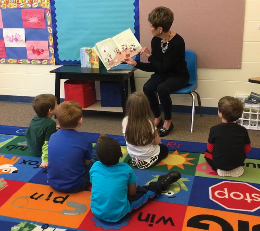 Volunteer readers share stories at TLC