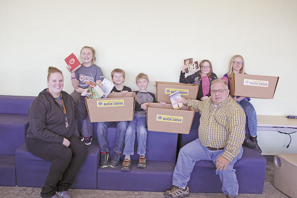 Charles City reading teacher partners with Lion’s Club to replenish classroom libraries