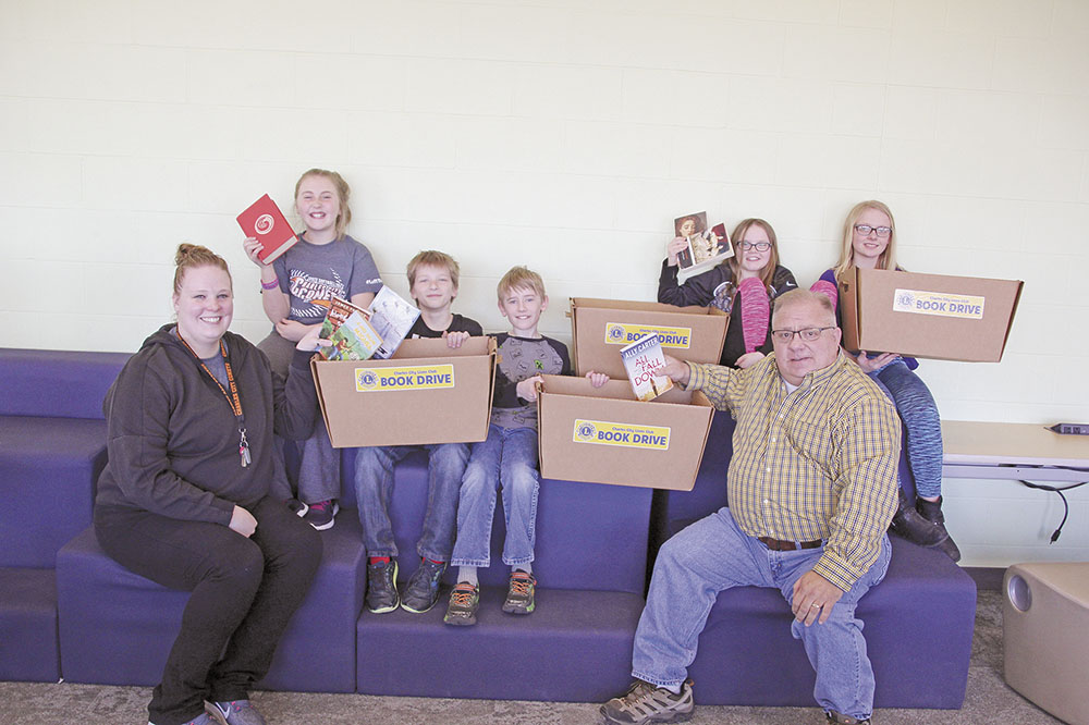 Charles City reading teacher partners with Lion’s Club to replenish classroom libraries