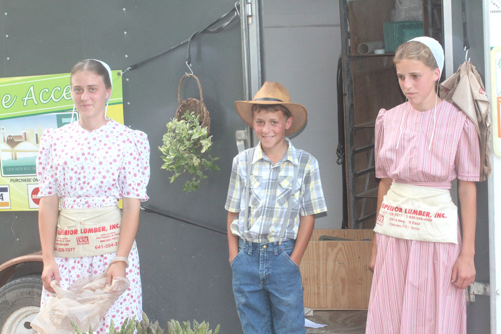 Local residents sell goods at farmers market