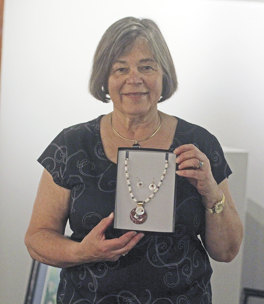 Schneckloth’s jewelry art and watercolors displayed at CCAC