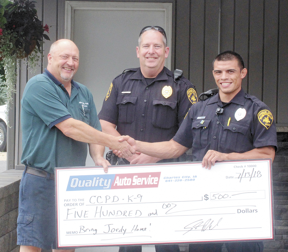 Quality Auto donates to police K9, challenges others to do the same