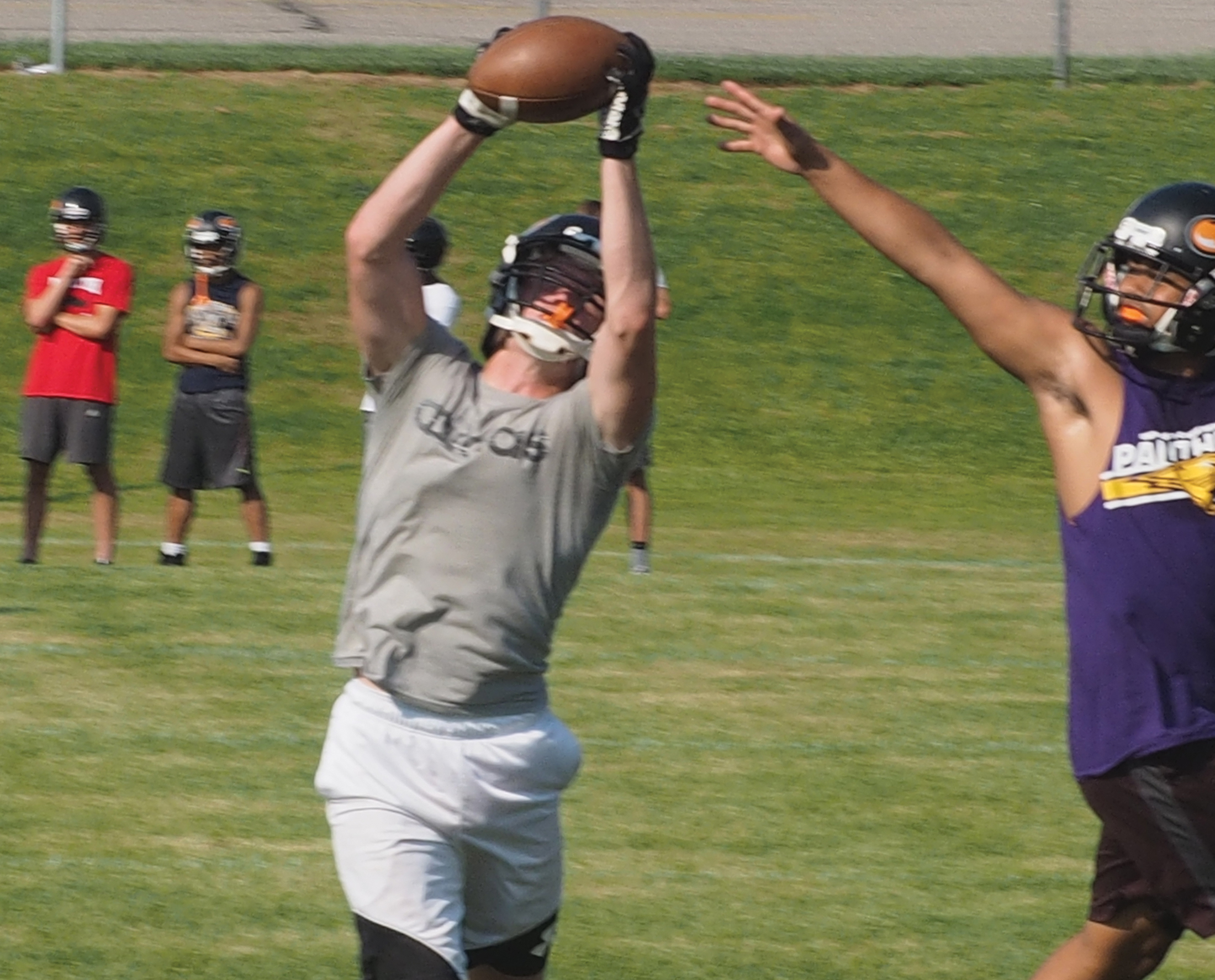 Comets hold first football practice; unwrap ‘presents’
