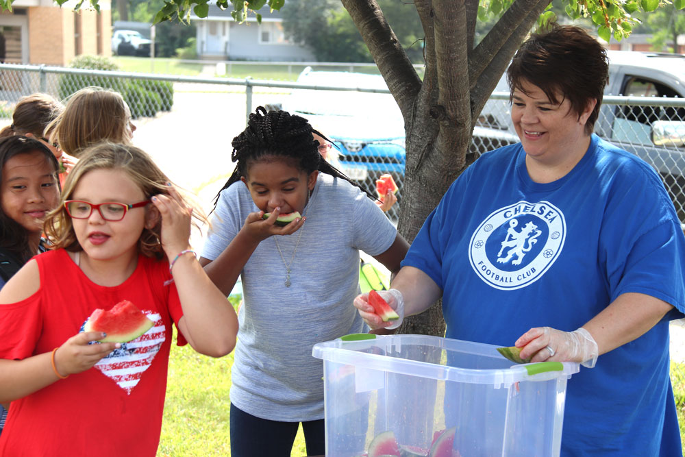 Watermelon feed closes out first day of school for IC kids