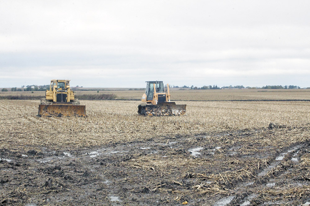 Area farmers about a week behind planting schedule