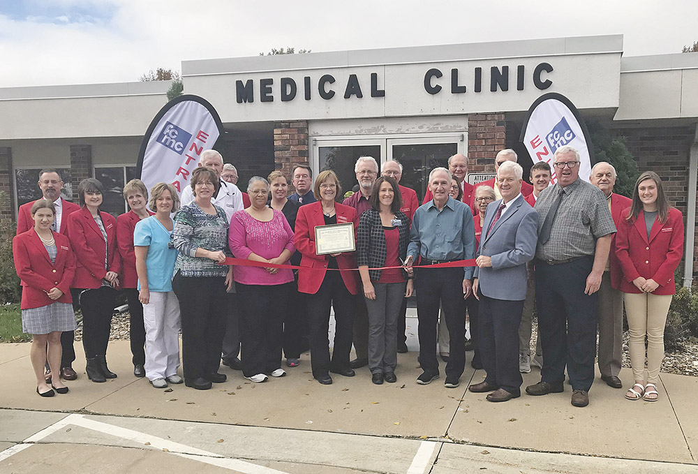 Ambassadors hold ribbon cutting to celebrate merger, renovations at clinic