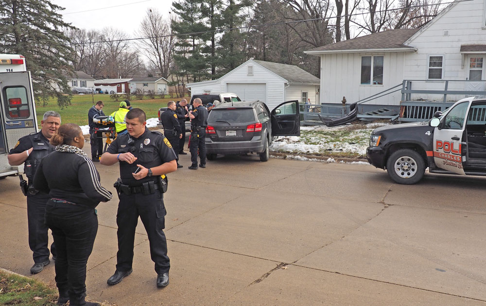 Vehicle strikes Charles City home’s front porch