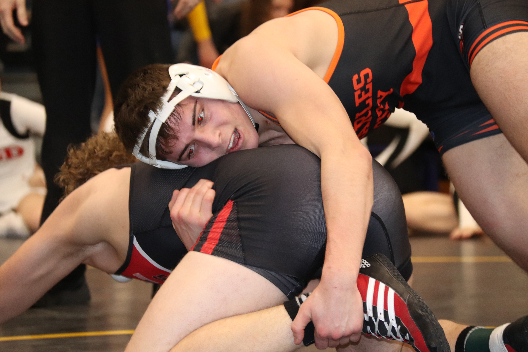Comets send 3 to State Wrestling Meet