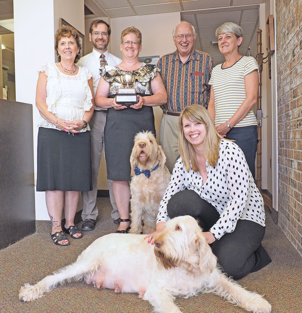 Law office dog honored as ‘ultimate companion’