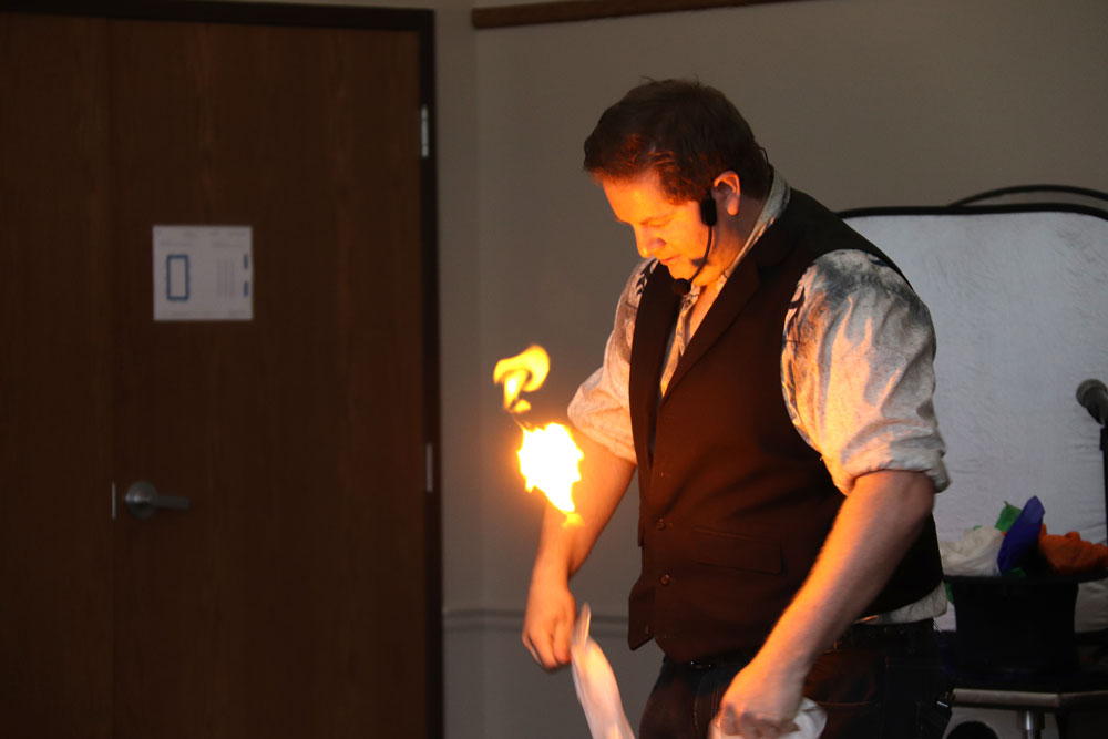 Eric Michaels Magician entertains kids at Charles City Public Library