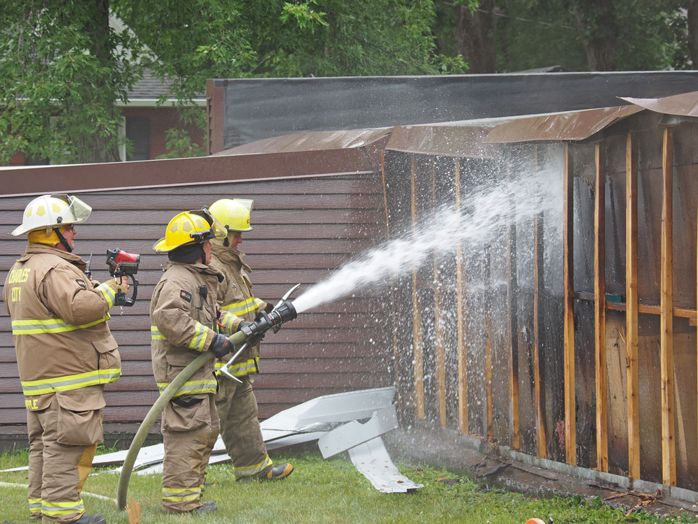 Firefighters extinguish small Charles City garage fire Wednesday afternoon