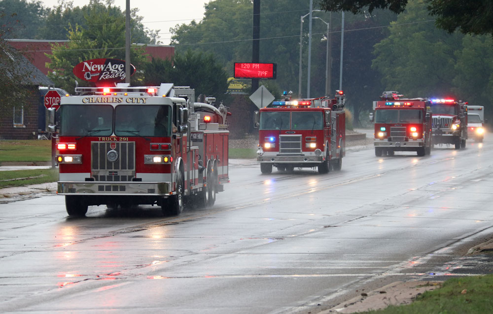 Caravan through town honors Charles City firefighter