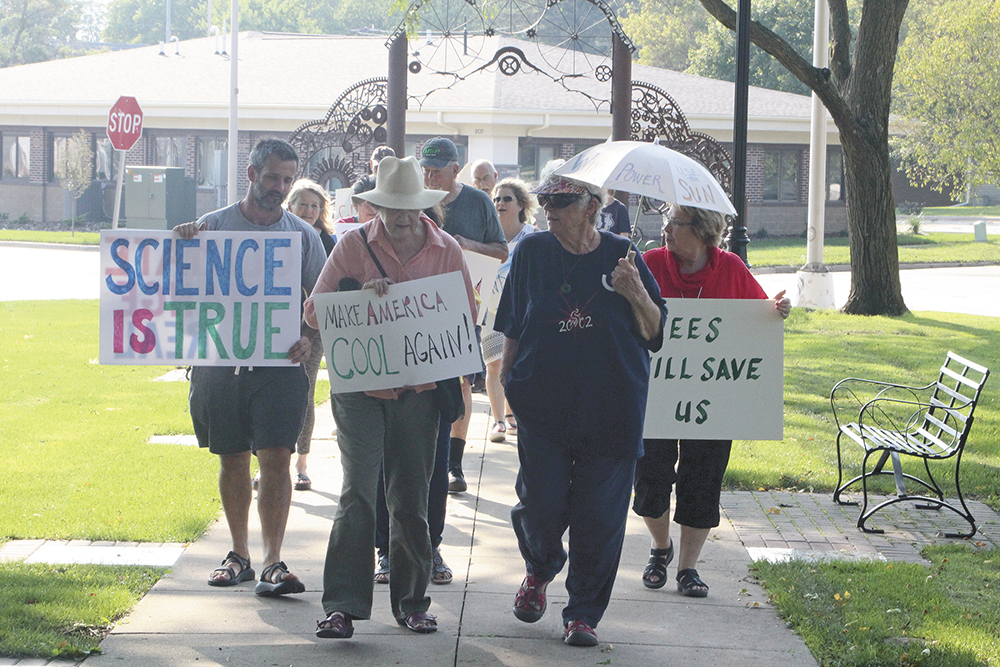 Local group demonstrates to raise awareness about climate change