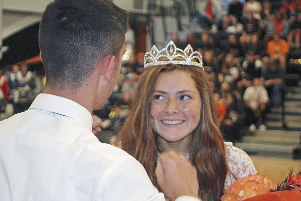 A king, a queen, and a pie in the face — all part of homecoming