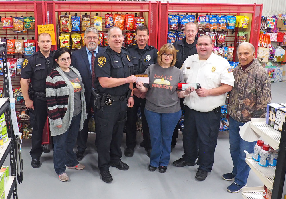 Donation honors Charles City police and fire departments