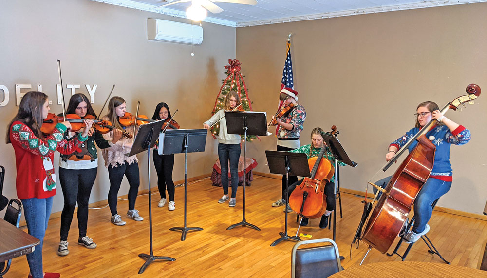 School groups spread music throughout Charles City during holiday season
