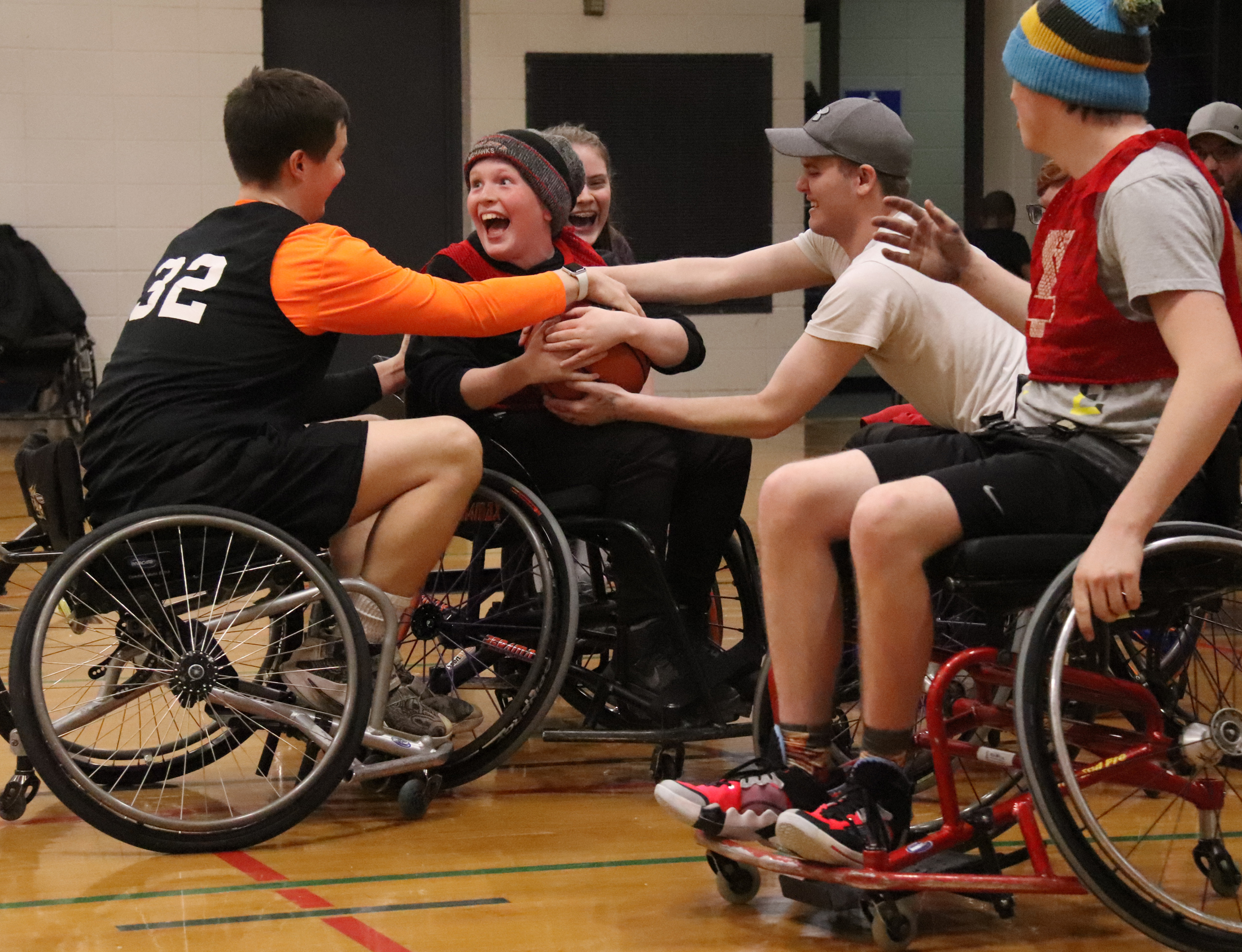 Vertical leap not required to roll with with wheelchair basketball players