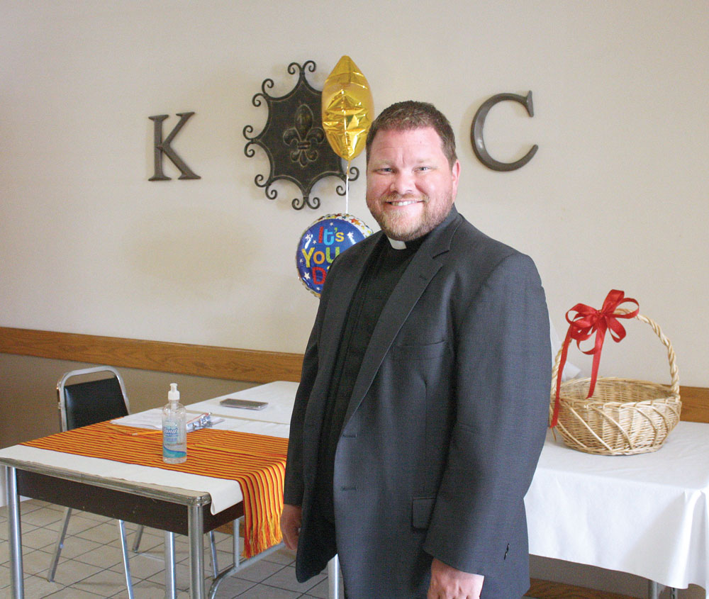 Charles City’s Immaculate Conception parishioners say goodbye to Father Mayer
