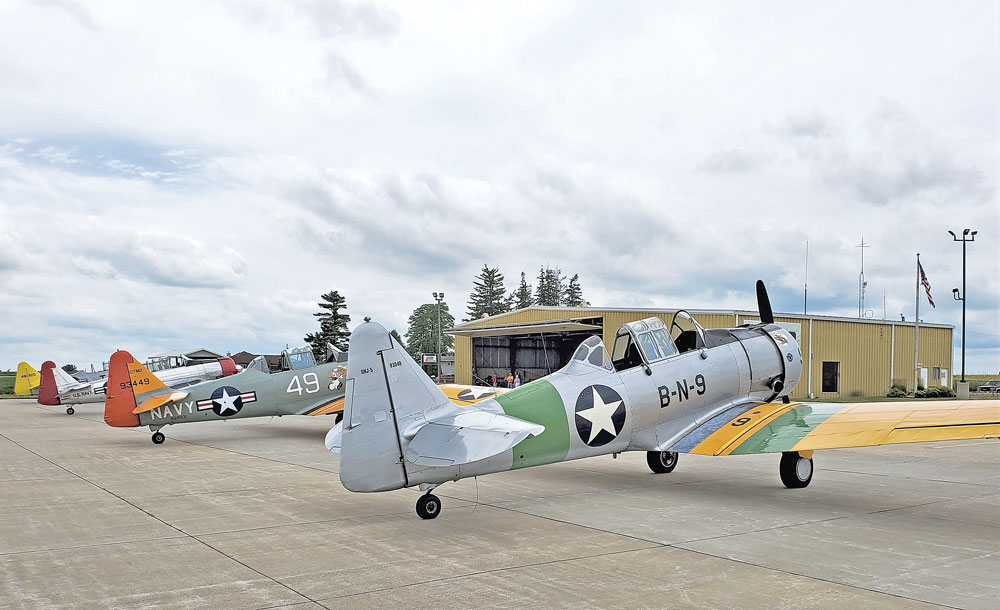 With no Oshkosh Air Show, vintage planes drop in at Charles City airport