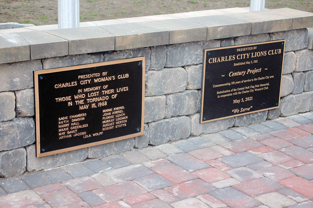 Lions install plaques on Charles City Central Park ‘Century Project’