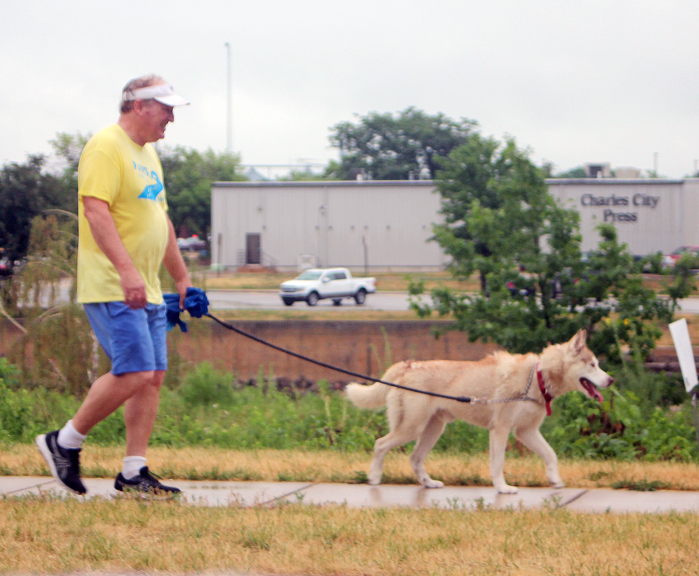 Rain dampens day, but the dogs still jog at PAWS Cedar Dog Jog in Charles City