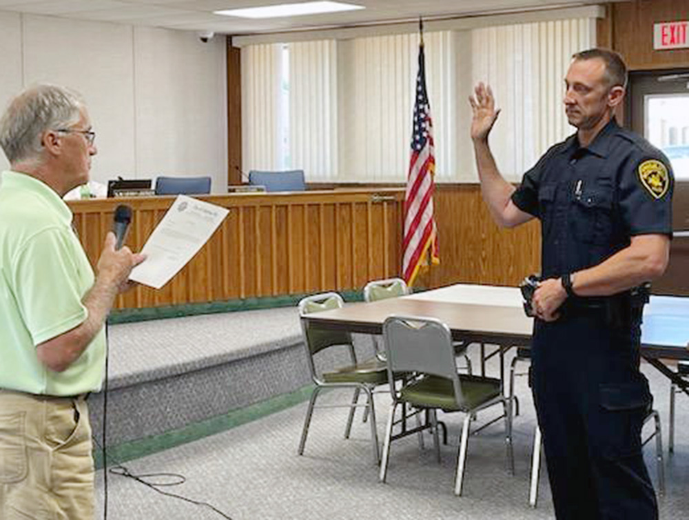Newest police officer sworn in at council meeting