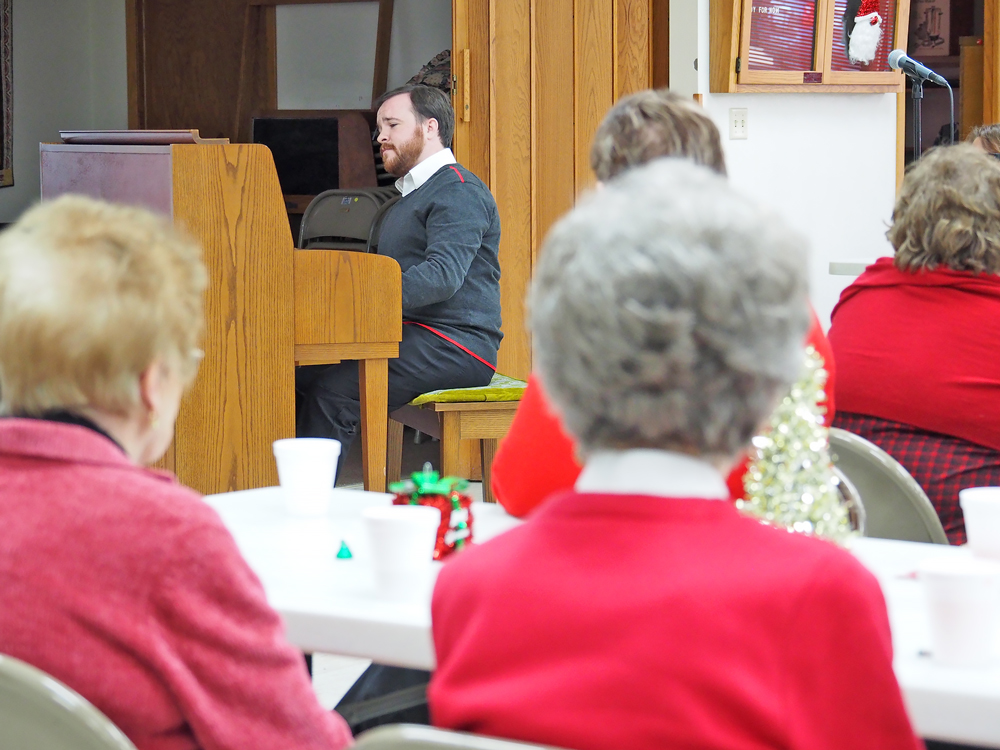 Sheckler entertains crowd at Charles City Senior Center Christmas party