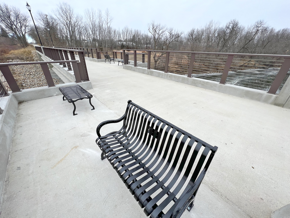 Donated benches installed on new Charles City trail bridge