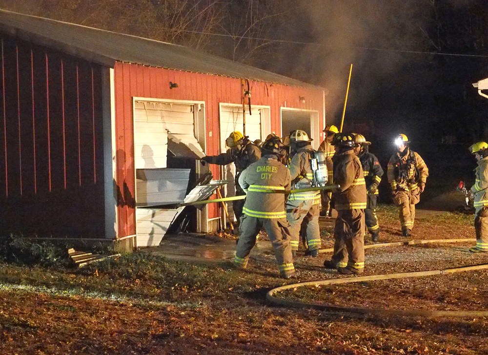 Charles City and area firefighters respond to garage fire