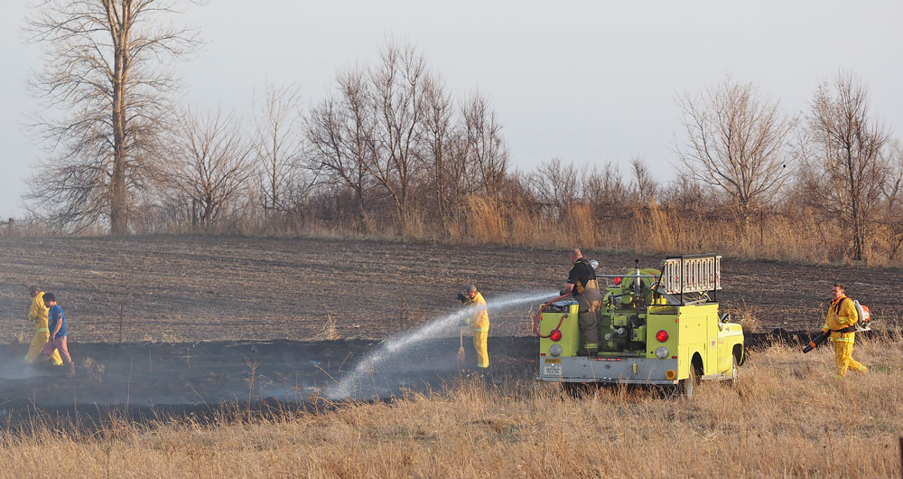 Area firefighters battle field blazes as burning bans, fire warnings take effect