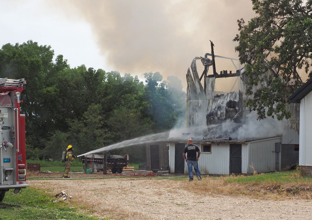 Area fire departments fight barn fire northeast of Charles City