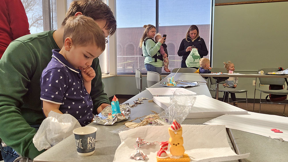 Kids sugar rush to library for Easter egg hunt
