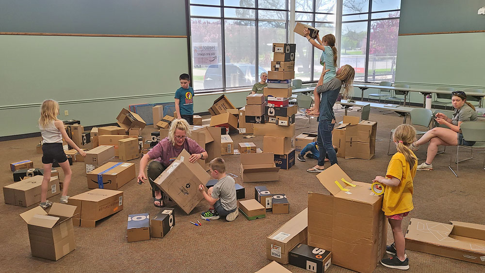 Building with boxes at the Charles City Public Library