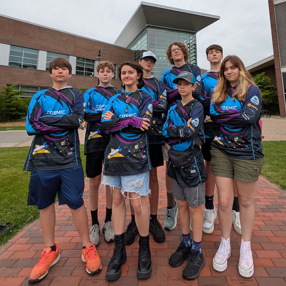 Cosmic Snowballs finish their middle school robotics career with a new high score at international contest